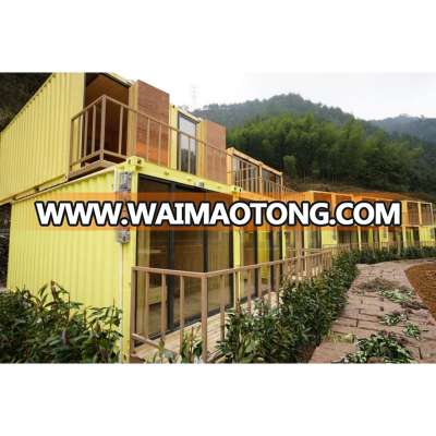 Yellow modified old boat board shipping container Homes for vacation